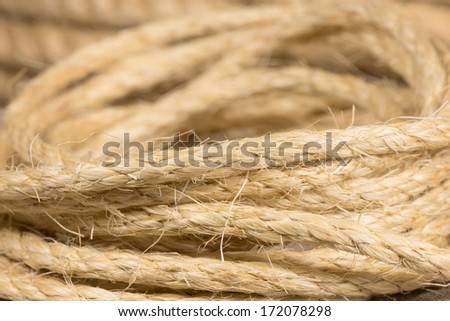 rope from natural fibers rolled rings - background