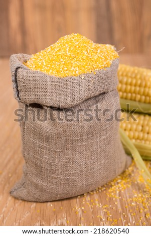 corn grits in the bag of coarse cloth and cobs