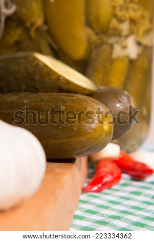 pickled gherkins in jars of home canning