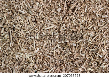 Wood chip shaving or shredded mulch material texture background