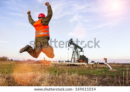 worker jumping with joy,best focus vest workers, soft focus, blurred motion,lens flare, flaring
