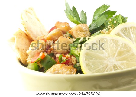 Healthy fresh chicken tabbouleh salad with pita chips