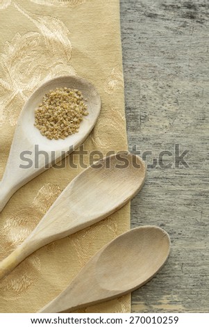 Healthy and organic bulgur wheat ready for cooking in this nutrition aware cooking background