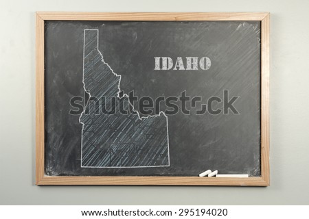 Outlined Idaho US state on grade school chalkboard