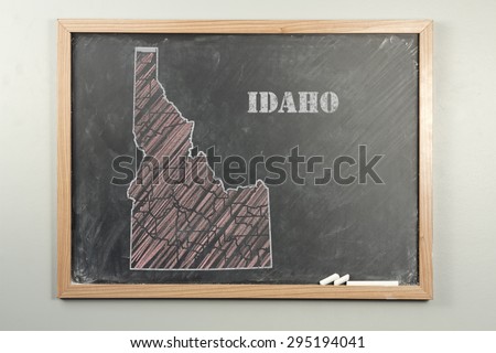 Outlined Idaho US state on grade school chalkboard
