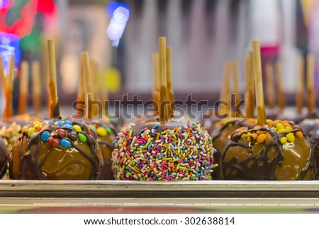 Tray of assorted variety of candy apples at state fair