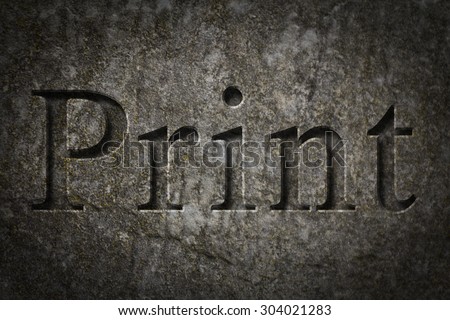 Engraving spelling the word Print on textured old surface
