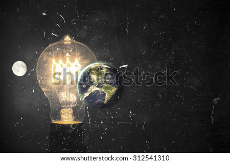 Planet earth and lightbulb for global power and energy concept, light bulb, Elements of image from NASA