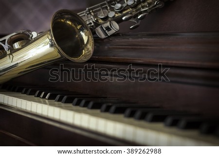 Old and worn Jazz saxophone and piano musical background