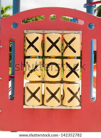 Tic Tac Toe - showing all crosses and one Zero - Odd one out