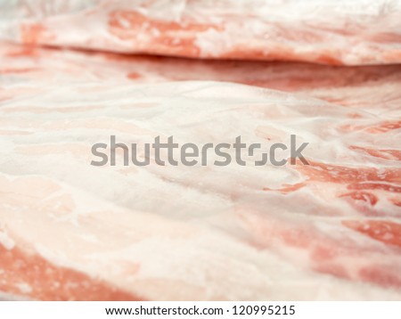 frozen meat in plastic package isolated isolated on white background