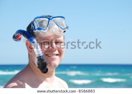 Man in Snorkel and Mask at Beach