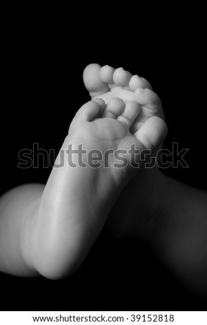 stock photo Pair of Baby Feet in Black White