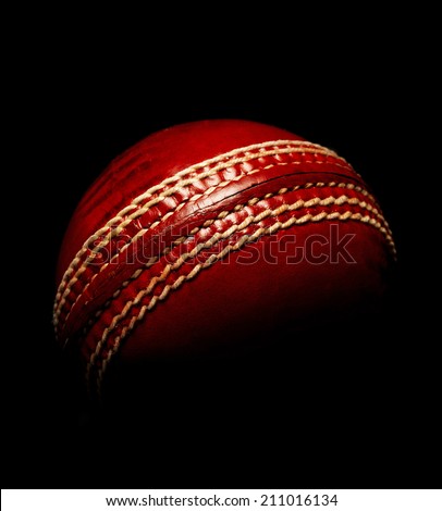 Red Leather Cricket Ball on black