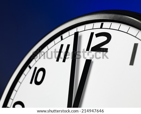 Close up clock face at 12 O'Clock