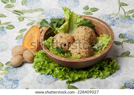 vegan balls of vegetables with greens in a still life