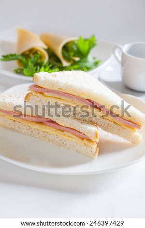two sandwich with ham and cheese butter lettuce