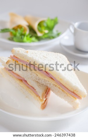 two sandwich with ham and cheese butter lettuce