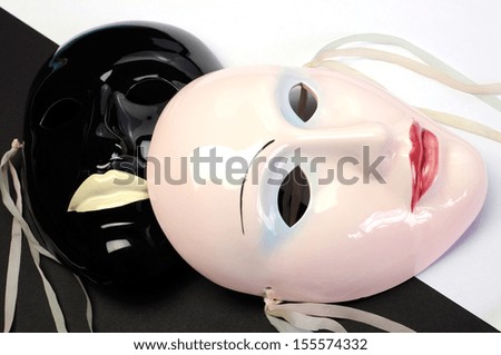 Black and white theme ceramic masks for acting, performance or theater concept. Close up.