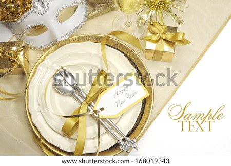 Gold theme elegant Happy New Year dining table place settings with white copy space for your text here.