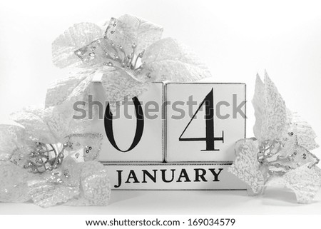 Save the Date calendar with white winter theme colors, snow covered pine tree, and poinsettia flowers, for birthdays, special occasions, holidays, weddings, or website events, for January 4.