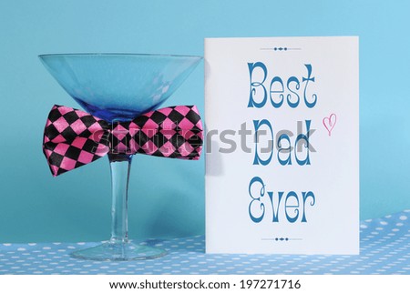 Happy Fathers Day, Best Dad Ever, greeting card with blue martini glass and fun pink check bow tie, on blue and polka dot background.