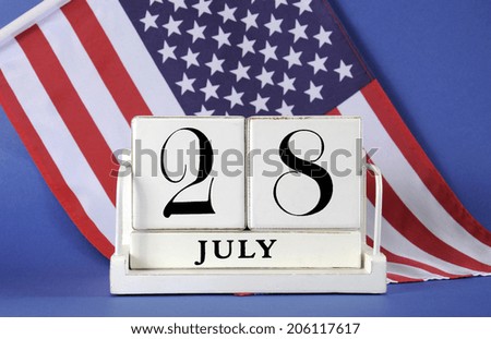 Vintage style white block calendar for 28 July, start of World War I, centenary, 1914 to 2014, with USA, stars and stripes flag.