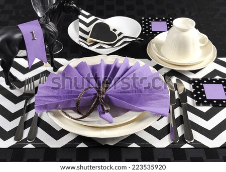 Black and white chevron with purple theme party luncheon table place setting for Melbourne Cup, Australian public holiday, horse race event