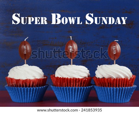 Red, white and blue theme cupcakes with football toppers for Super Bowl Sunday party or collage football finals and playoffs, with sample text greeting.