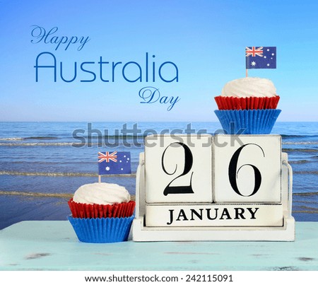 Happy Australia Day, January 26, theme white wood vintage calendar and red, white and blue cupcakes with view of Australian beach background, with sample text greeting message.