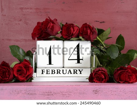 Happy Valentine Day vintage wood calendar for February 14 on red and pink vintage wood background with bouquet of red roses.