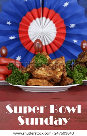 Super Bowl Sunday football party celebration food plates with chicken buffalo wings, meat balls, hot dogs and USA party decorations, with text, vertical.