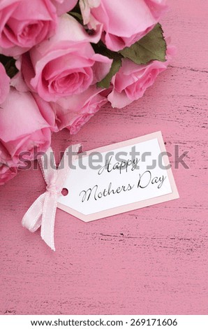 Happy Mothers Day Pink Roses on Vintage style distressed pink wood table.