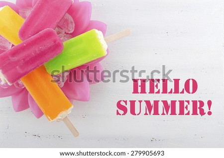 Summer is Here concept with bright color ice pop, ice creams with Hello Summer text.
