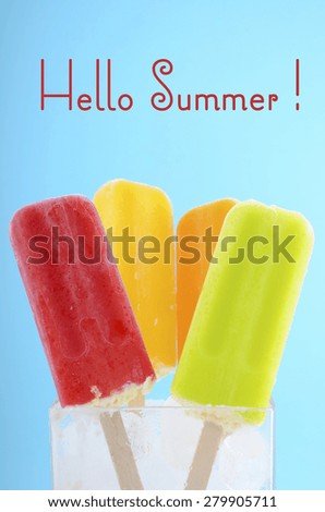 Summer is Here concept with bright color ice pop, ice creams on blue background and Hello Summer text.