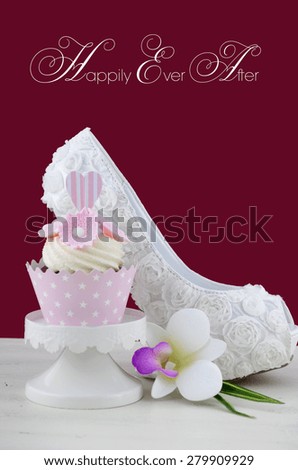 Beautiful white high heel shoe on white shabby chic table with Happily Ever After text,