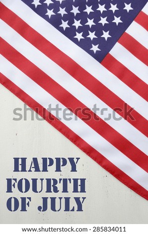 USA stars and stripes flag on white wood background with sample text for Fourth of July and National holidays.