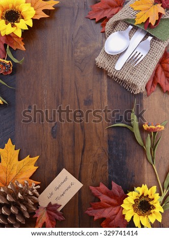Happy Thanksgiving dark wood background with decorated borders.