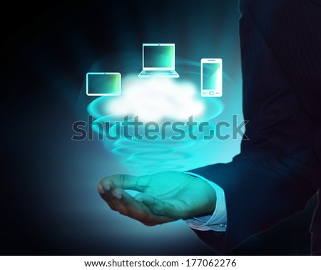 Cloud Twister in business man hands, this illustrates the concept of cloud computing network in business