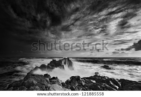 Dramatic mood beach scene in black and white