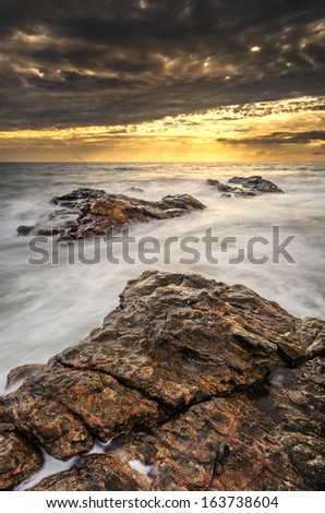 Beautiful beach photo, sea, dramatic clouds and stunning light