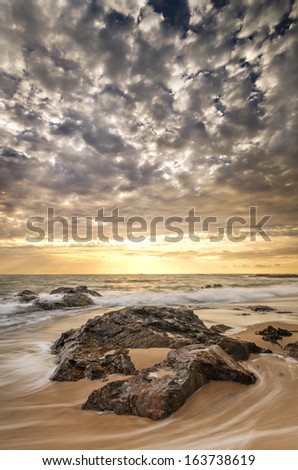 Beautiful beach photo, sea, dramatic clouds and stunning light