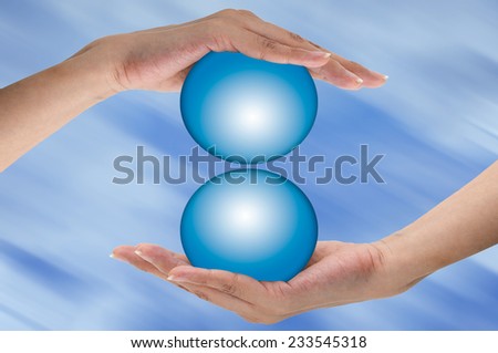 Asian woman hand holding blue ball.  Safe earth conception, Preventive and protect.