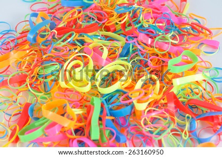 Pile of colorful hair rubber band.