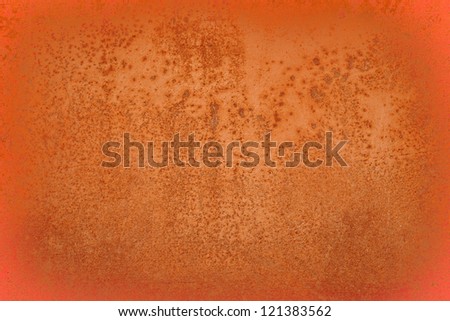 Rusty surface of an orange textured background