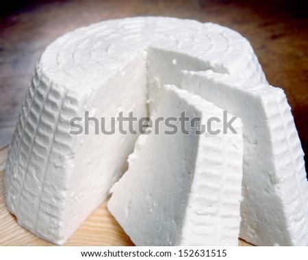 Italian ricotta cheese, a soft cheese resembling cottage cheese made from the whey of sheep milk and used primarily in the making of desserts