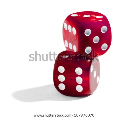 Two red stacked dice with numbered faces to throw or toss to generate random numbers used in gambling and table-top games