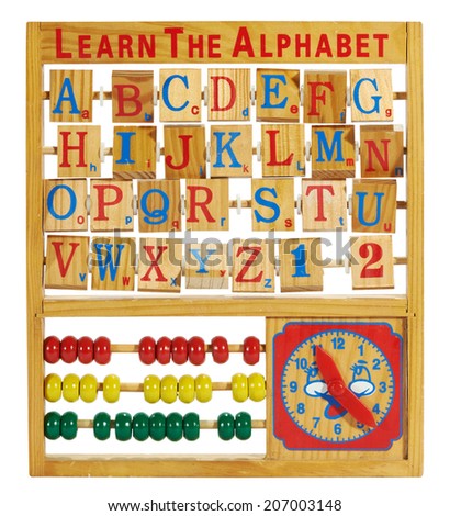 Colorful educational wooden toy with the letters of the alphabet for learning spelling , an abacus for counting and calculations and a clock to learn the time