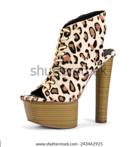 Stylish modern trendy ladies leopard print high heel shoe with a platform sole, laces and sling back heel, side view on white