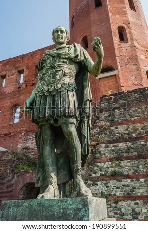 Roman Statue in front of Palatine Door - Turin. Italy